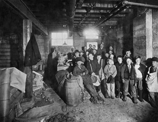 Boys Picking Up Papers To Sell, United States, c.1919