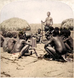Braves of a Zulu Village holding a Council, near the Umlaloose River, Zululand, S.A., 1901