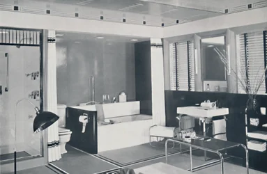 Crane Co. - A Black, White, Red and Grey Scheme with an Unglazed Ceramic Tile Floor, Oyster-White Walls