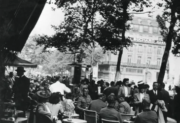 German army officers relaxing outside the Cafe de la Paix, Paris