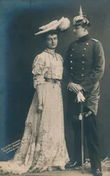 German couple. With male in dress uniform