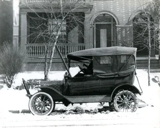 Hermann von Schrenk in a 1916 Ford in front of his house at 4139 McPherson, St. Louis, Mo