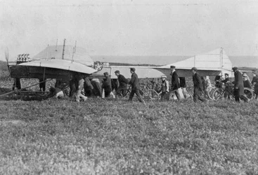 Hubert Latham prepares to take off after Louis Bleriot, near Calais, France