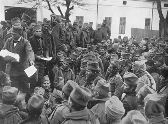Issuing passes for a few days leave at home to the wounded Serbian troops at Nish, 1915