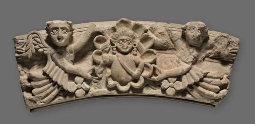 Keystone of an Arch: Female Bust within a Medallion Supported by Angels