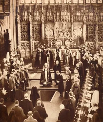 King Edward VIII sprinkles earth on his father