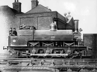 North Staffordshire 0-6-0 steam locomotive with driver and fireman on the footplate, 19th century