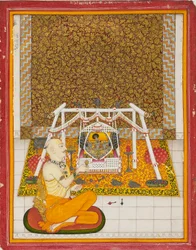 Priest at a Krishna shrine