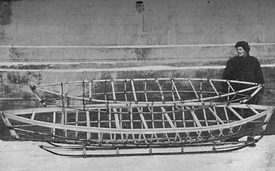 Skeletons of Kayak for One Man Bamboo, and Double Kayak, Lying on a Hand-Sledge