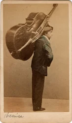 Portrait of a Double Bass Player, the Instrument on His Back, Venice