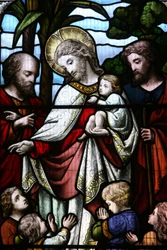Stained glass window depicting Jesus welcoming children, Billingshurst, United Kingdom