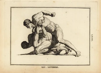 Statue of two naked male wrestlers