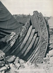 The Oseberg Ship in the Mound, Showing the Carving on Stem and Railing