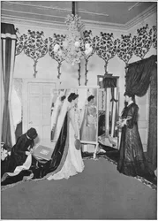 The finishing touches of a dressmaker, London