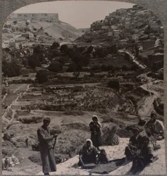 Threshing on roof, overlooking the valley of Kedron