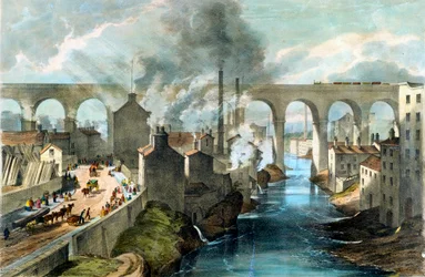 Train crossing Stockport viaduct on the London & North Western Railway