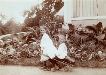Two children playing outdoors