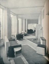 View of the Sun Room in daylight, showing the three windows and columns