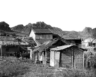 Village Huts in Korea, 1900