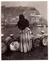 Woman and barrels, Whitby Harbour, c 1905