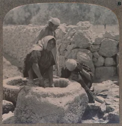 Women drawing water at the Fountain of the Magi, on the road to Bethlehem, c1900