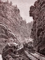 A train crossing Colorado mountains. U.S.A. in 1886