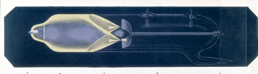 Fluorescence caused by cathode rays in a gas discharge tube