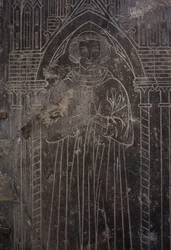 Fragment of a Stone plate. Bas-relief. A church official.