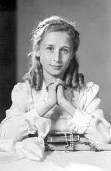 Christian Girl with Hands Joined in Prayer Position with Bible, Rosary and Candle (Photo of Communion) - 1932