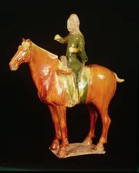 Glazed figure of a mounted drummer T