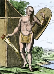 History of Indigenous Peoples: An Indian of Canada holding a shield, a bow and arrows in a quiver