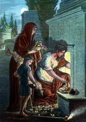 Mourners making sacrifices at the tomb of their beloved dead at the catacomb area at Rome, Italy