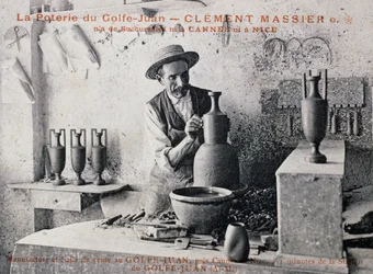 Postcard with Clement Massier (1844-1917), master potter of Poterie de Golf-Juan at work in his studio, France, 20th century