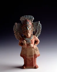 Pre-Columbian art, Mayan civilization, late classical period: statuette of anthropomorphic clay representing a standing figure, has the function of musical instrument. from Nebaj, Quiche, Guatemala. Dim. 21x11 cm Guatemala, Museo Nazionale di Archeologia e