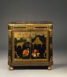 Regency tole peinte black japanned side cabinet, showing front doors painted with figures of merchants in a landscape, rare