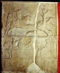 Stela relief depicting a wild boar hunt (stone)