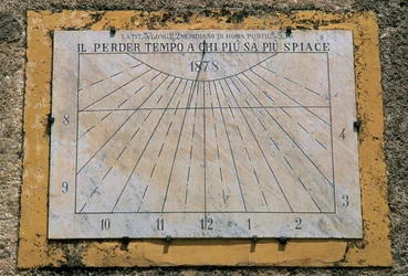 Sundial, side wall of Church of Maria Santissima Assunta, Palazzo Adriano, Sicily, Italy