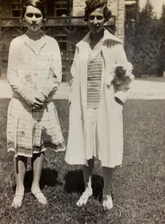 Two young women on vacation at Lake Carezza