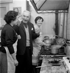 Writer Giovanni Comisso in His House in Treviso (He Tastes a Dish in the Kitchen) - 1962