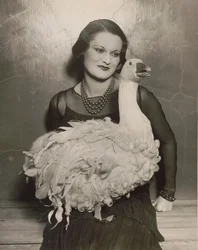 British actress Isla Bevan holding an exotic goose