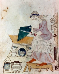 A young woman sharpening a knife. Miniature taken from a Provençal manuscript of the “Sayings of the Philosophers” type (MS Palat. 586), 14th century. Biblioteca Nazionale, Florence