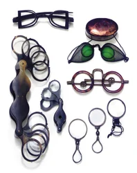 An Assorted Collection of Eyewear and Magnifiers