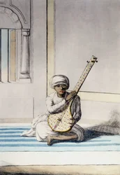 Culture, civilization and Indian society: Musician playing Thambourah, traditional instrument of India. Engraving 1808