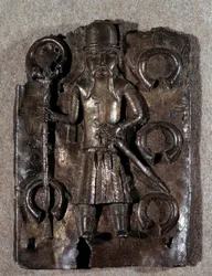 Brassware plate carved by a Portuguese warrior