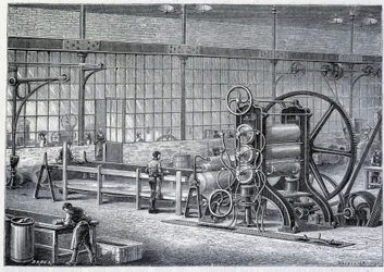 Large rolling mill to reduce blocks of purified rubber into sheets - in 
