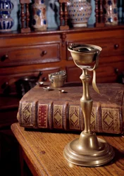 Oil Lamp, Weight and Book of Apothecary