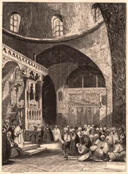 Rabbi and congregation in a synagogue in Jerusalem