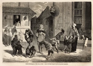 Small saltibanks performing acrobatic numbers in music in the streets of Yedo (Edo, present-day Tokyo). Engraving to illustrate the voyage to Japan, in 1863-1864, by Aime Humbert, minister of the Swiss Confederation, in Le tour du monde