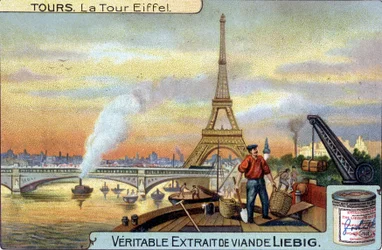 The Eiffel Tower seen from the Seine in Paris in the evening