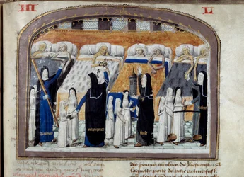 A room of the Hôtel-Dieu in Paris filled with sick persons assisted by the nuns. Miniature from a manuscript from 1482